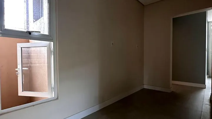 Apartamento de 02 dormitórios central com garagem