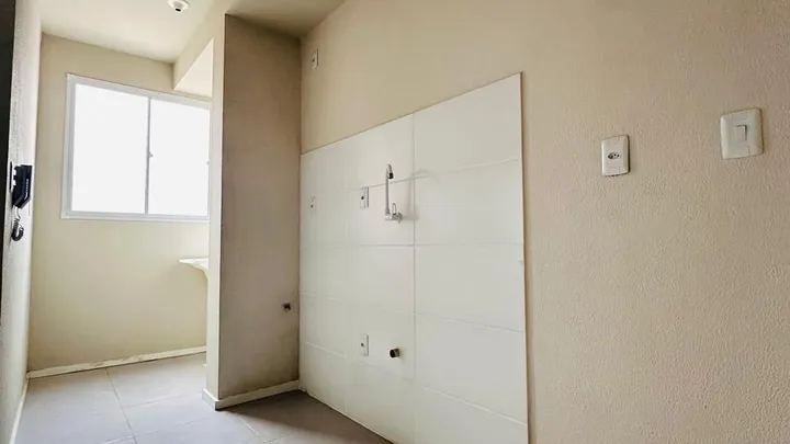 Apartamento 02 dormitório com estacionamento